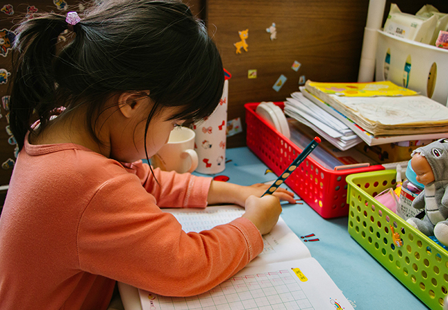 Early Years child writing